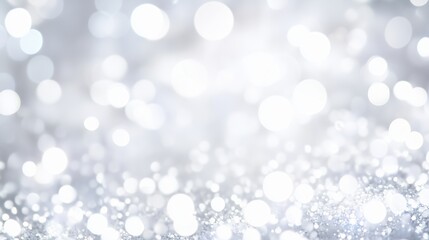 Obraz premium Abstract silver and white glitter background with bokeh lights. Festive sparkling texture for the holidays. Christmas and winter celebration backdrop