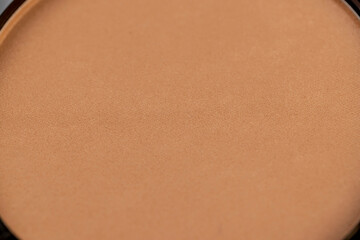 a jar of women's cosmetics for face makeup, details of new embossed solid cosmetics for applying makeup