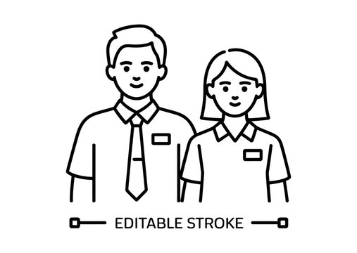 Two people in uniforms stand together with name tags on their chests.