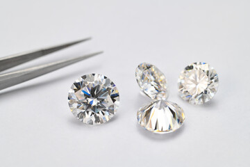 Four white diamonds are displayed on a white background