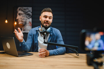 Content creator recording podcast in home studio