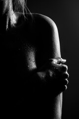 black and white female breasts close-up 