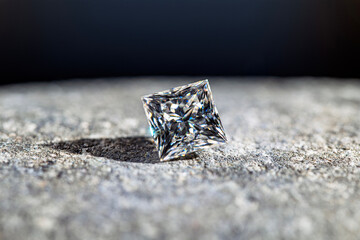 A diamond is sitting on a rock