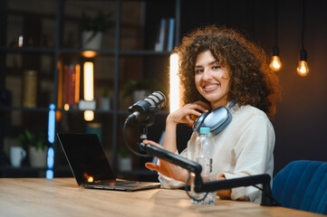 Content creator recording podcast in home studio