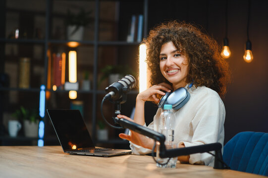 Content creator recording podcast in home studio