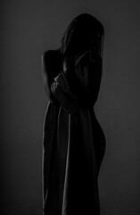 silhouette of a female body close-up