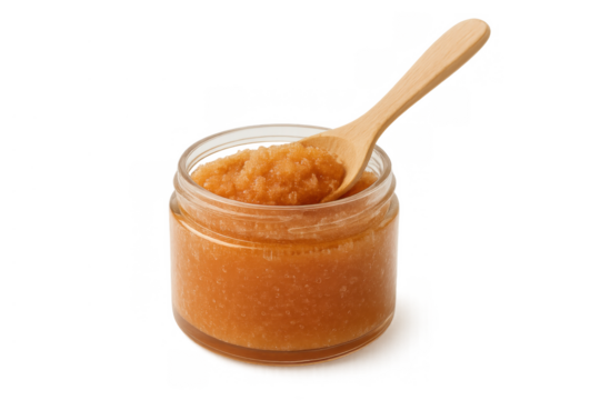 Body scrub with exfoliating texture in clear jar, wooden spoon, natural product for skincare beauty, transparent background - Powered by Adobe