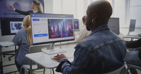 Focused Man Creating Futuristic City Image With AI Software in Modern Classroom. African American Man Using AI Software to Generate Image. Concept of Digital Transformation Through AI in Education.