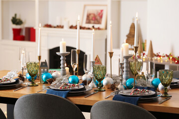 Festive table setting with Christmas decor at home