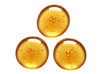 Three Golden Honey Drops Cosmetic Serum with Bubbles — isolated on tranparent background png

