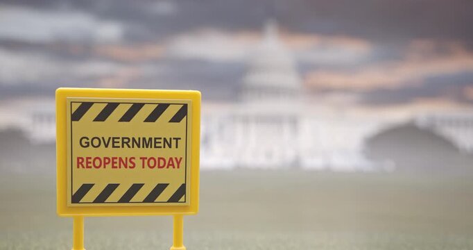 A sign announcing the reopening of the U.S. federal government after a shutdown, with the Capitol building in the background. Concept for public administration, political events, economic updates, etc