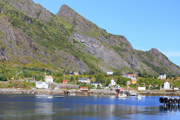 Moskenes harbor with fishing boats and the fisherman's home. Lofoten