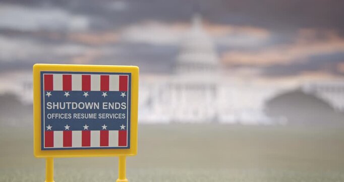 A sign announcing the reopening of the U.S. federal government after a shutdown, with the Capitol building in the background. Concept for public administration, political events, economic updates, etc