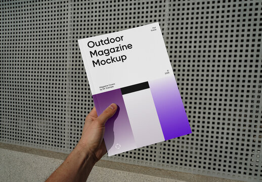 Hand Holding Magazine Mockup