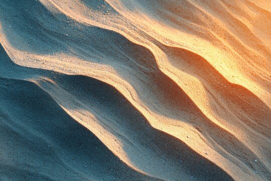 Close-up of textured sand dunes in warm hues