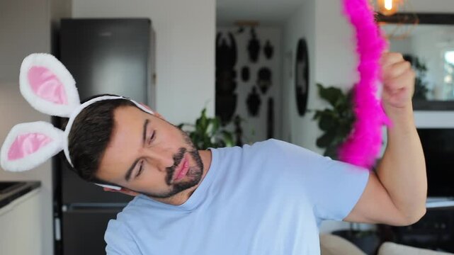 Cute man with easter bunny ears 
