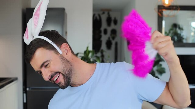 Cute man with easter bunny ears 