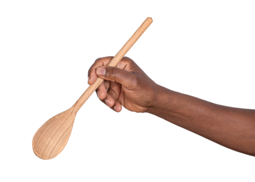 Hand holding a wooden spoon isolated on white or transparent background	