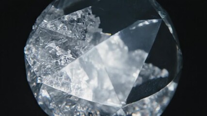 Abstract crystal orb floating against a dark background - Powered by Adobe