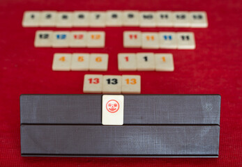 Family Board Game Rummikub, personal perspective with Joker Tile in Focus