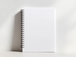 Blank White Spiral Notebook Vertical Mockup