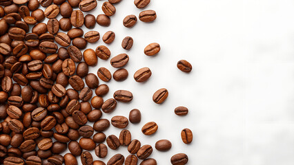 Obraz premium Roasted coffee beans background scattered on white surface perfect for coffee shop menus and product packaging