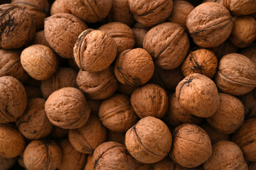 Lots of walnuts closeup food background