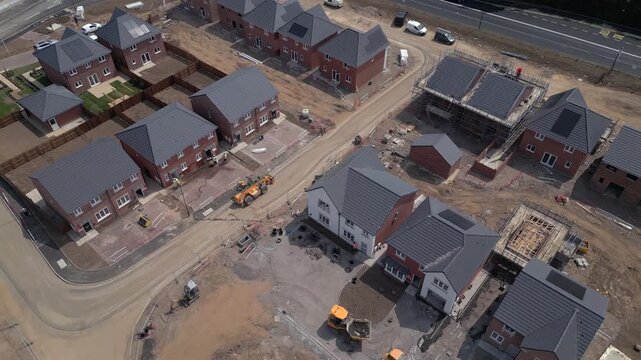 Construction progress of new residential homes in suburban area during daytime at Miller Homes, in Catterick Garrison, UK.