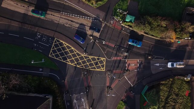 Aerial video above a crossroad junction by the Long Bridge in Barnstaple UK
