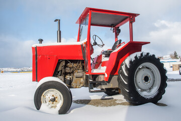 beautiful red tractor on a beautiful winter day