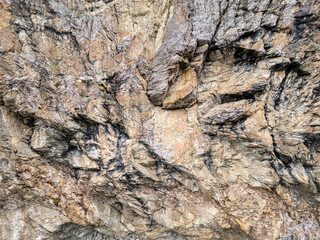 Rugged Rocky Cliff Texture With Cracks And Jagged Surfaces For Backgrounds