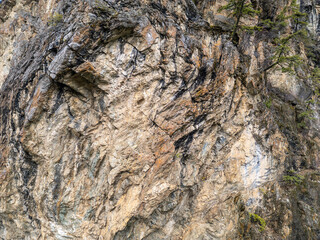 Rugged Rock Face Cliffs With Textured Granite And Sparse Greenery, BC Canada