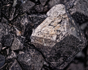 Magnetite Crystal from Kovdor, Kola Peninsula, Russia. Sharp Octahedral Habit and Metallic Luster. Natural Iron Ore Mineral Macro