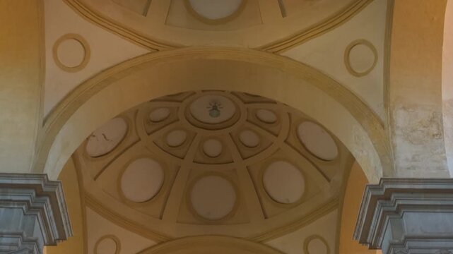 Majestic cathedral interior architecture and crucifix: zooming in. Revealing ornate cathedral interior featuring grand dome and crucifix, highlighting architectural and religious symbolism