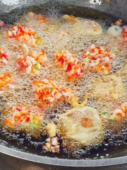 "Cipuk" literally means starch or tapioca flour and crackers. Basically, it's quite similar to Cireng, where starch or tapioca flour is coated in crackers and then fried