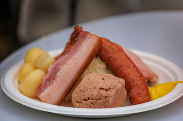 Choucroute garnie, sauerkraut with sausages, Christmas Market, Strasbourg France