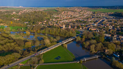 High view of autumn town landscape with church spire