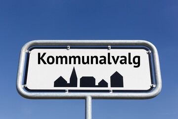 Road sign with Danish text Danish municipalities elections 