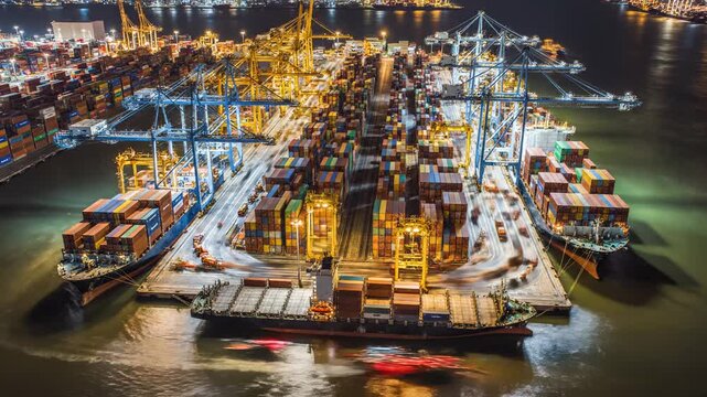 Aerial view of cargo ships at night, brightly lit. A captivating shot of a bustling import-export harbor. Global logistics, international trade, supply chain.