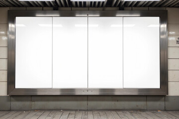 Four squares blank billboard advertising poster on a subway station platform wall. Space for text for advertising signage ideas for mockup.