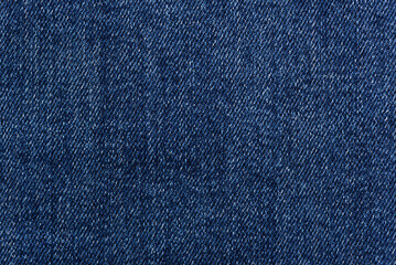 Naklejka premium Washed denim fabric texture background