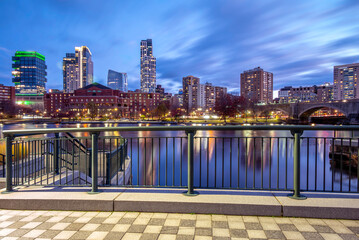 View of the iconic architecture of Boston in Massachusetts, USA at night showcasing the North End of the city with its mix of contemporary and historic buildings.