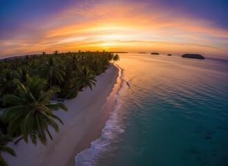 Aerial view of a tropical beach at sunset, vibrant sky, palm trees, turquoise water