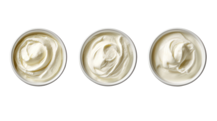 Three swirls of creamy mayonnaise isolated on transparent background