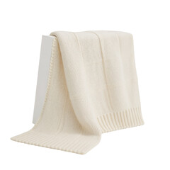 Elegant ivory knit throw blanket draped over a minimalist stand in subdued lighting