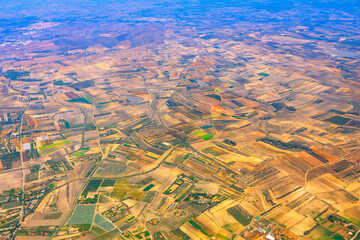 Aerial photo shows a patchwork of agricultural fields found in Spain. Landscape is a mosaic of...