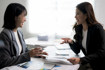 Businesswomen discussing business strategy during office meeting