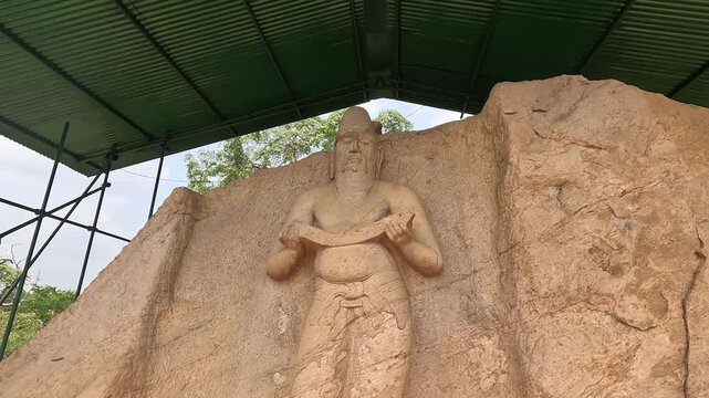 Historic statue of King Parakramabahu standing near Pothgul Vehera in Polonnaruwa, Sri Lanka