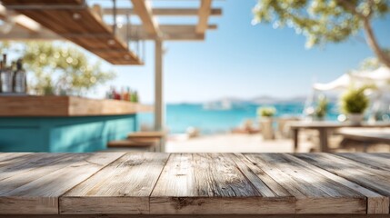 Obraz premium Wooden table top, out of focus beachside bar
