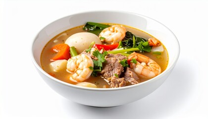 Fototapeta premium Sinigang Filipino sour tamarind soup with pork, shrimp, and vegetables